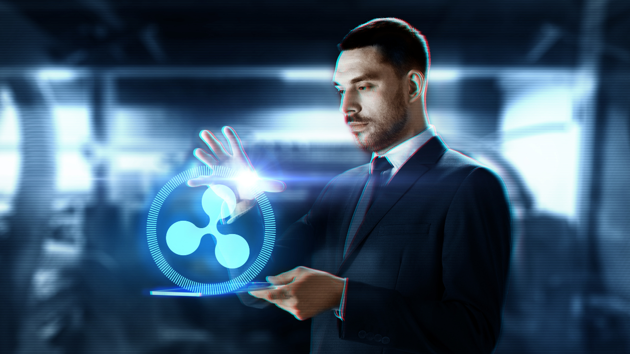 image of a man standing in the midst of the XRP blockchain symbols and lights